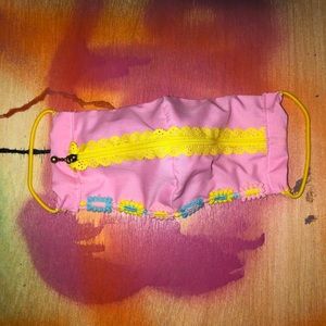 Pink and yellow “Zip the lips” face mask